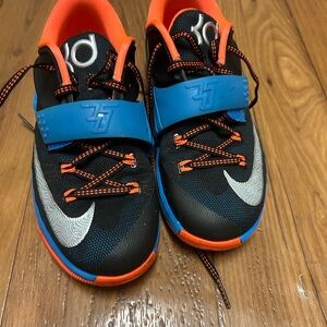 Nike Kids Black, Orange, and Blue Sneakers